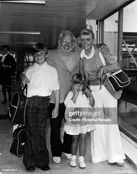 American actor Mickey Rooney with his seventh wife Carolyn Hockett and two children from a previous marriage, Jimmy and Jonella, pose for a...