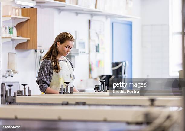 Screen Printing Machine Photos and Premium High Res Pictures - Getty Images