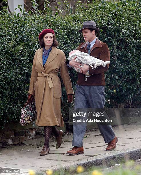 Marion Cotillard and Brad Pitt seen filming scenes for 'Five Seconds Of Silence in Hampstead on March 31, 2016 in London, England.