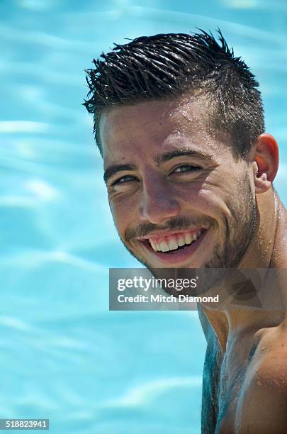 young adult man in swimming pool - bartstoppel stock-fotos und bilder