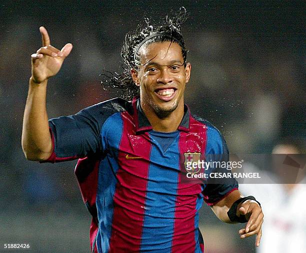 - Picture taken 15 October 2003 of Barcelona's Brazilian striker Ronaldinho celebrating after scoring a goal during an UEFA Cup football match in...