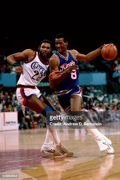 Eddie Johnson of the Sacramento Kings drives to the basket against the Los Angeles Clippers circa 1984 during an NBA game in Los Angeles, California....