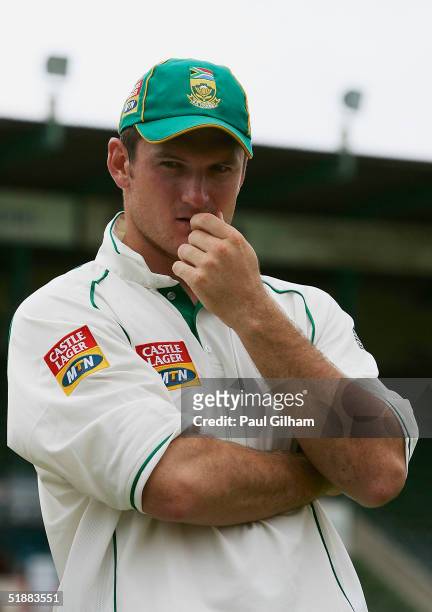 Graeme Smith of South Africa look dejected following defeat to England during day five of the first Test Match between South Africa and England at...