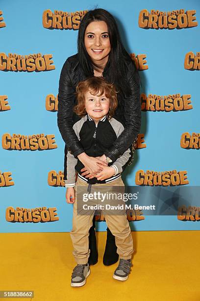 Natalie Sawyer and son attend a VIP screening of "Robinson Crusoe" at the Vue West End on April 3, 2016 in London, England.