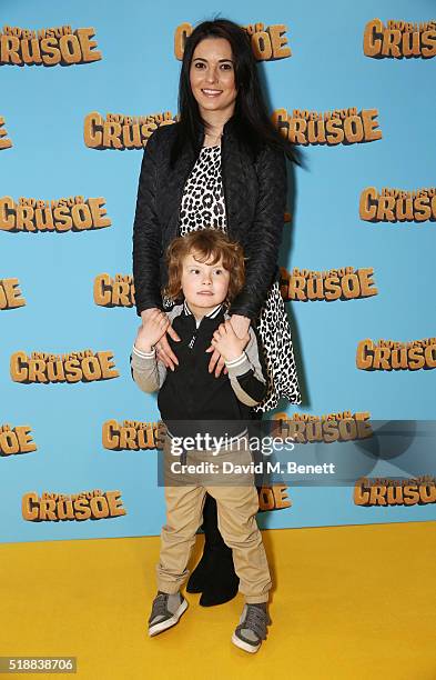 Natalie Sawyer and son attend a VIP screening of "Robinson Crusoe" at the Vue West End on April 3, 2016 in London, England.