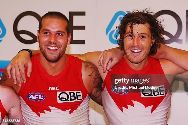 Lance Franklin of the Swans and Kurt Tippett sing the club song after winning during the round two match between the Carlton Blues and Sydney Swans...