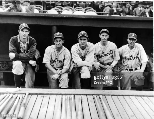 The Detroit Tigers pitching staff with manager Mickey Cochrane in the dugout at Navin Field during the American League pennant doubleheader against...