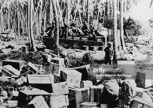 View of US soldiers and supplies on a beach, Rendova Island, Solomon Islands, 1944.