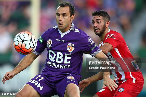 Richard Garcia of the Glory controls the ball against Michael Zullo of Melbourne during the round 26 A-League match between the Perth Glory and...