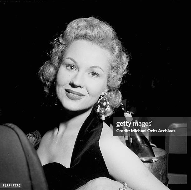 Virginia Mayo poses at a party in Los Angeles,CA.