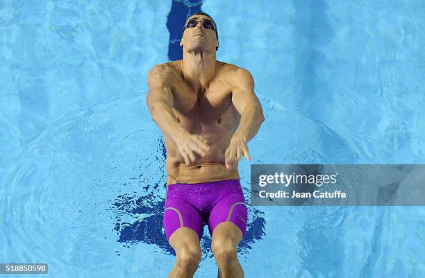 Camille Lacourt of France wins the men's 100m backstroke final and qualifies for the Olympic Games in Rio during day 5 of the French National...