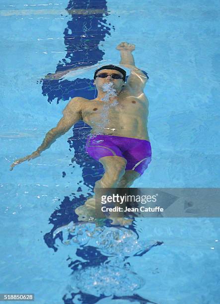 Camille Lacourt of France wins the men's 100m backstroke final and qualifies for the Olympic Games in Rio during day 5 of the French National...