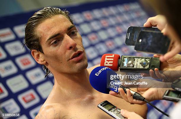 Camille Lacourt of France wins the men's 100m backstroke final and qualifies for the Olympic Games in Rio during day 5 of the French National...