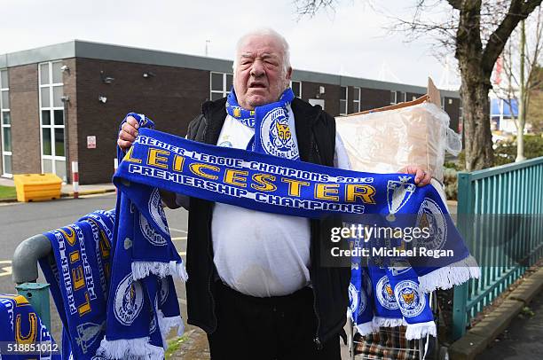 Scarves reading 'Leicester City Premiership Champions' are sold prior to the Barclays Premier League match between Leicester City and Southampton at...