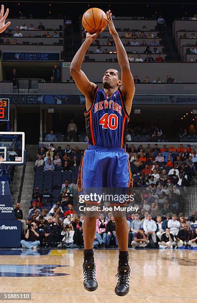 Kurt Thomas of the New York Knicks shoots a free throw against the Memphis Grizzlies during the game at FedEx Forum on December 7, 2004 in Memphis,...