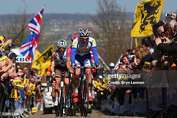 Gijs Van Hoecke of Belgium and Topsport Vlaanderen -Baloise leads the peloton up the Oude Kwaremont during the 100th edition of the Tour of Flanders...