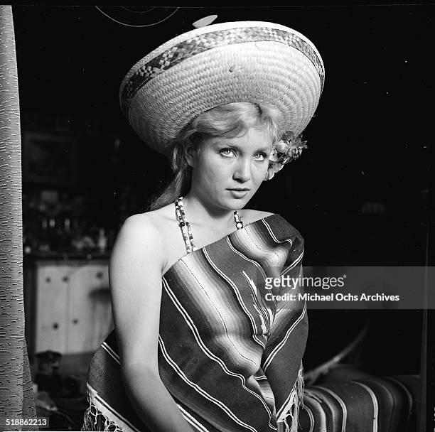 Susan Oliver poses in a sombrero in Los Angeles,CA.