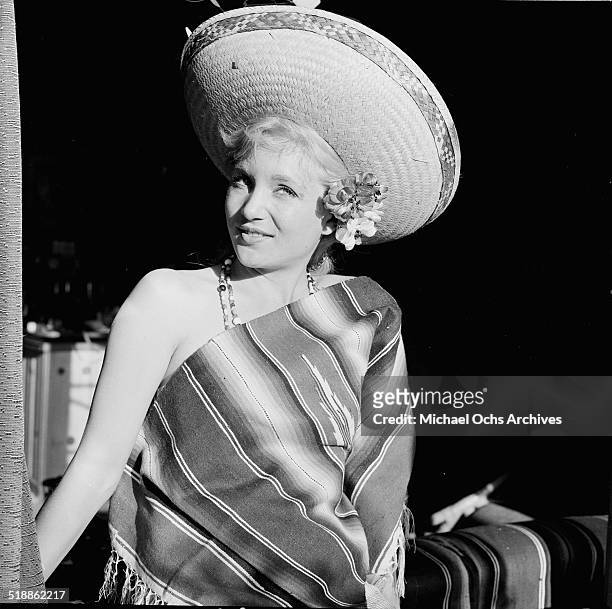 Susan Oliver poses in a sombrero in Los Angeles,CA.