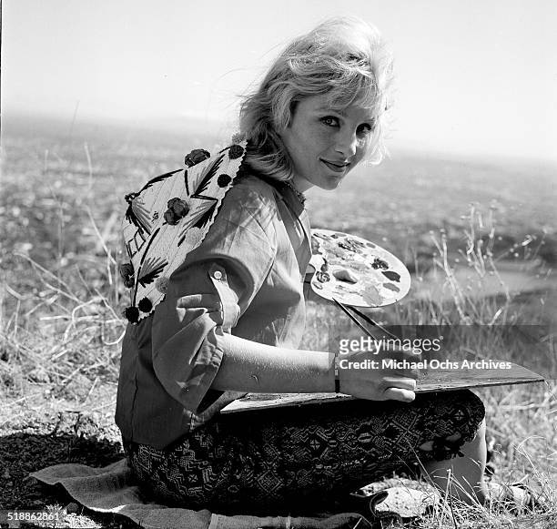 Susan Oliver poses for a portrait painting in Los Angeles,CA.