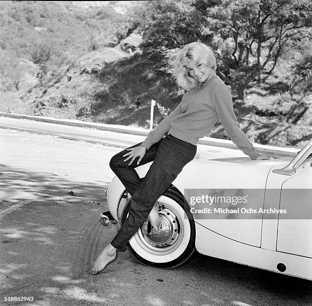 Yvette Mimieux poses for a portrait with a car in Los Angeles,CA.