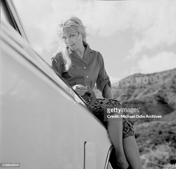 Susan Oliver poses for a portrait by the Hollywood sign in Los Angeles,CA.