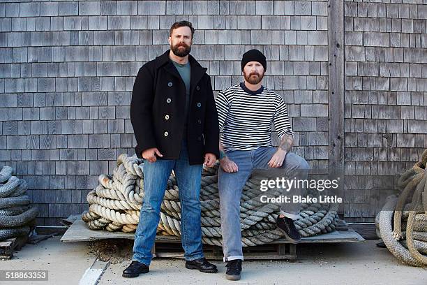 two sailors with piles of rope - provincetown stockfoto's en -beelden