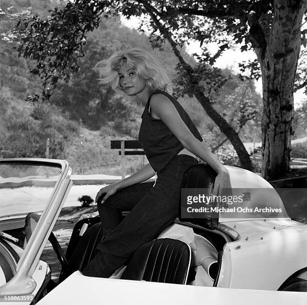 Yvette Mimieux poses for a portrait with a car in Los Angeles,CA.