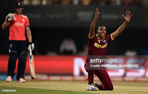West Indies's Samuel Badreecelebrates after his dismissal of England's Jason Roy during the World T20 cricket tournament final match between England...
