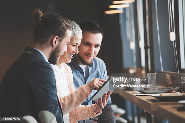 business people at cafe - breakfast meeting stock pictures, royalty-free photos & images