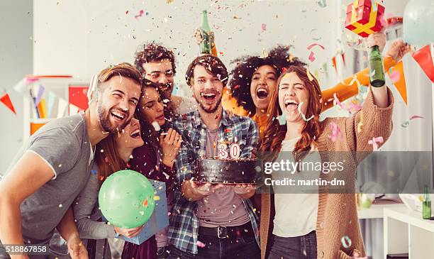 geburtstagsfeier im büro - woman holding cake stock-fotos und bilder