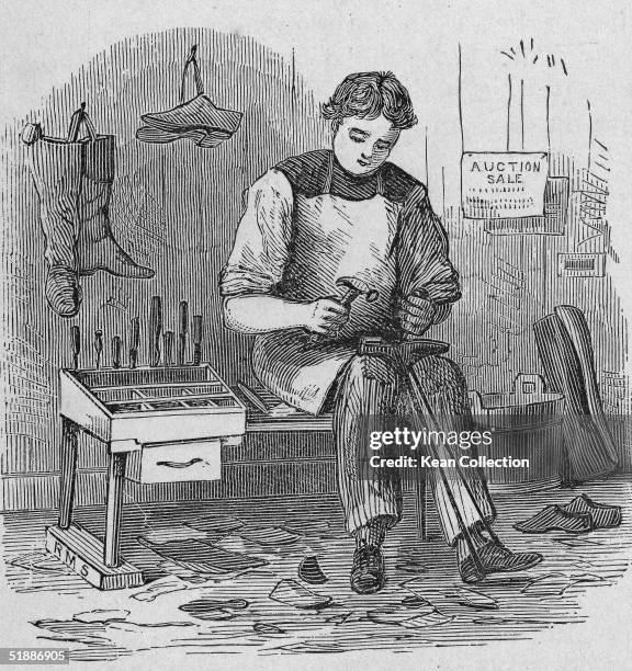 Engraving shows a shoemaker as he wears an apron, sits on a cobbler's bench in his workshop, and pegs a boot by hand, mid to late 19th Century....
