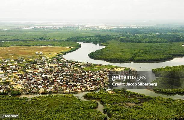 Large village sits along the mangrove swamps of the Niger Delta, home to Nigeria's oil reserves October 12, 2004 near Port Harcourt, Nigeria. A...