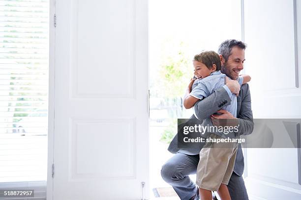 i missed you dad! - arrival hug stock pictures, royalty-free photos & images