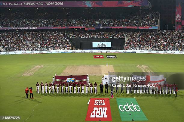 Teams line up for the national anthems during the ICC World Twenty20 India 2016 final match between England and West Indies at Eden Gardens on April...