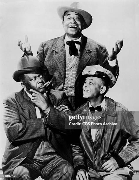 American actors Spencer Williams , Tim Moore , and Alvin Childress in a publicity still for the television series 'Amos 'n' Andy,' early 1950s.