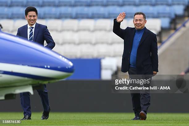 Leicester City owner Vichai Srivaddhanaprabha waves as he heads towards his helicopter on the pitch after the Barclays Premier League match between...