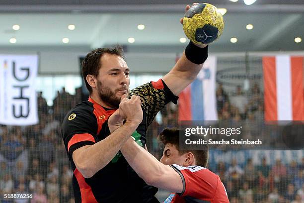 Michael Mueller of Germany throws the ball during the handball international friendly match between Germany and Austria at Schwalbe arena on April 3,...