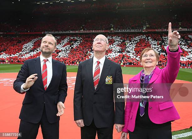 Executive Vice Chairman Ed Woodward, Sir Bobby Charlton of Manchester United and Lady Norma Charlton attend the unveiling of a stand renamed in Sir...