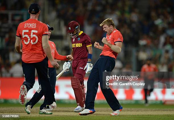 David Willey of England celebrates dismissing Lendl Simmons of the West Indies during the ICC World Twenty20 India 2016 Final between England and the...