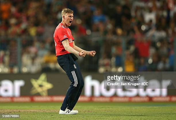 Joe Root of England celebrates the wicket of Johnson Charles of the West Indies during the ICC World Twenty20 India 2016 final match between England...