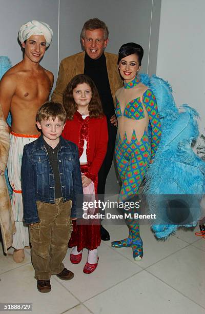 Golfer Colin Montgomery poses with dancers from the English National Ballet at the Nutcracker Ballet gala pre-party at St Martins Lane Hotel,...
