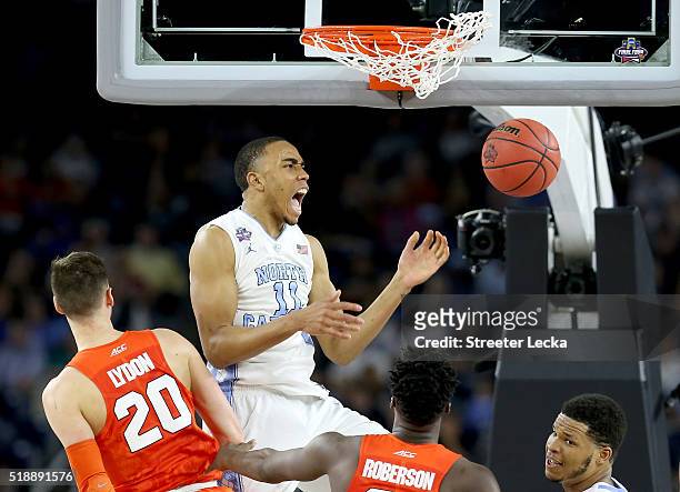 Brice Johnson of the North Carolina Tar Heels dunks the ball against Tyler Lydon of the Syracuse Orange in the second half during the NCAA Men's...