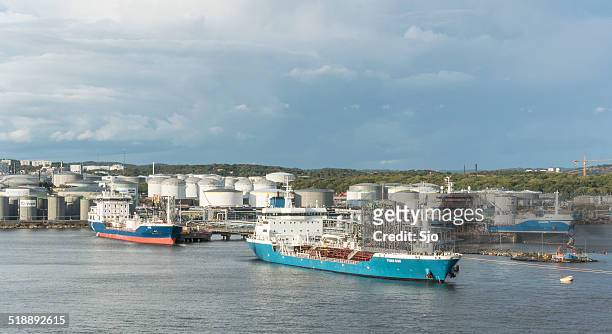 oil tankers in a harbor - gasoline storage stock pictures, royalty-free photos & images