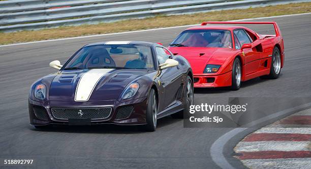 ferrari 599 gtb and f40 - supercar stock pictures, royalty-free photos & images