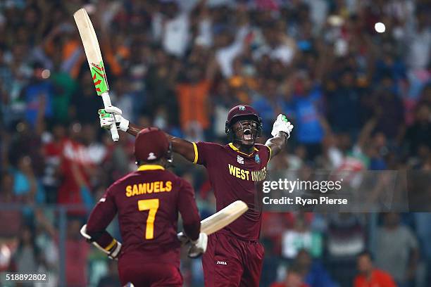 Carlos Brathwaite of the West Indies celebrates hitting the winning runs during the ICC World Twenty20 India 2016 Final match between England and...