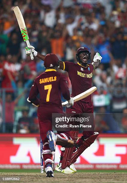 Carlos Brathwaite of the West Indies celebrates hitting the winning runs during the ICC World Twenty20 India 2016 Final match between England and...