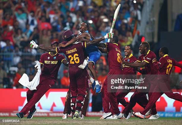 West Indies celebrate victory after Carlos Brathwaite of the West Indies hit the winning runs during the ICC World Twenty20 India 2016 Final match...