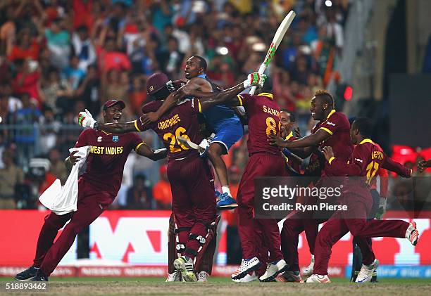 West Indies celebrate victory after Carlos Brathwaite of the West Indies hit the winning runs during the ICC World Twenty20 India 2016 Final match...