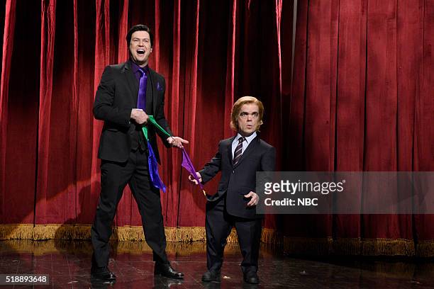 Peter Dinklage" Episode 1699 -- Pictured: Taran Killam and Peter Dinklage as Mr. Peterson during the "Corporate Magic Show" sketch on April 2, 2016 --