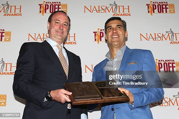 Head coach Jay Wright of the Villanova Wildcats poses with Barry Goheen, Chairman of King & Spalding LLP, after being named the 2016 Naismith College...